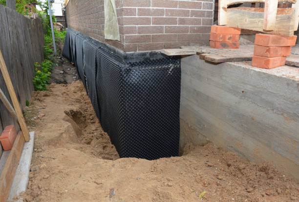 SJ Waterproofing Pros technician performing targeted Emergency Waterproofing assessment in Georgetown, PA